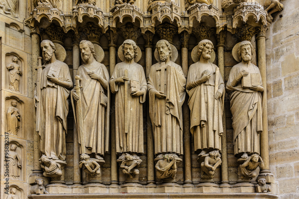 Sculptures at main entrance to cathedral Notre Dame de Paris.
