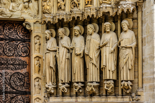Sculptures at main entrance to cathedral Notre Dame de Paris.