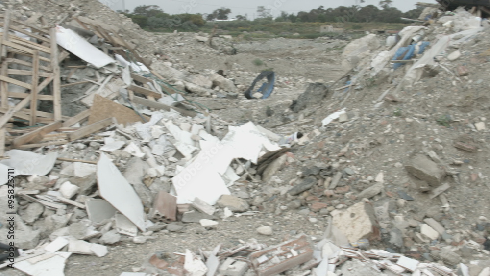 Panorama view of neglected landfill site. Tones of waste contaminating nature Panorama view of neglected landfill site. Tones of waste contaminating nature