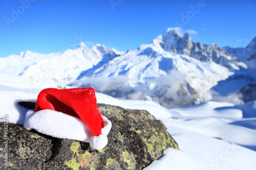 santa hat in mountains
