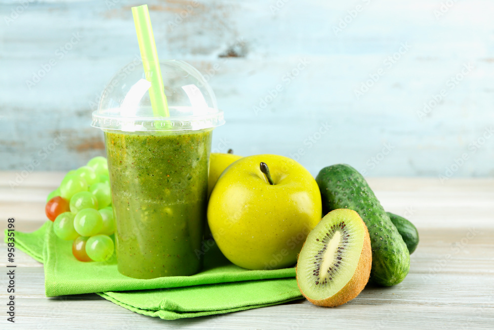 Fresh juice mix fruit, healthy drinks on wooden table, on bright background Fresh juice mix fruit, healthy drinks on wooden table, on bright background