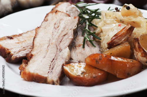 Roasted bacon with potato and sauerkraut