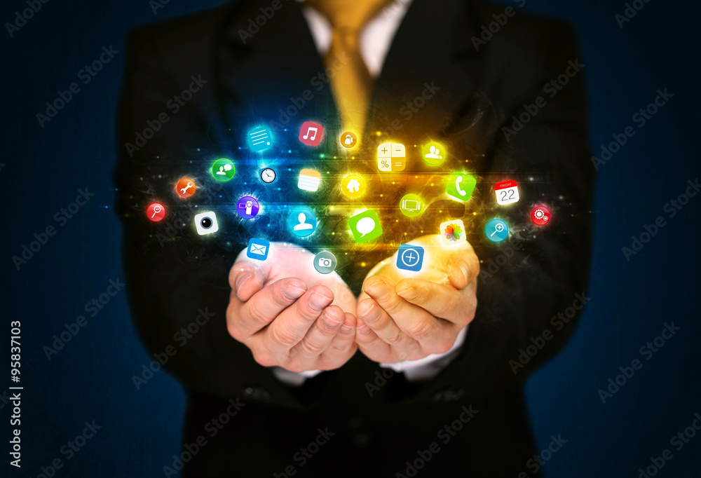 Businessman holding app icon cloud Businessman holding app icon cloud