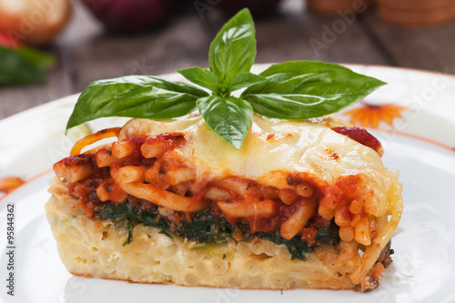 Pasticcio with chard and tomato sauce photo