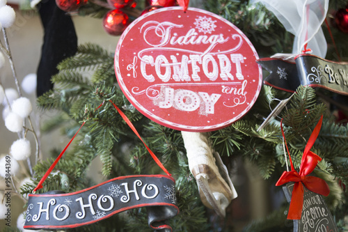 Christmas tree decoration ornaments for the holidays, tidings of comfort and joy