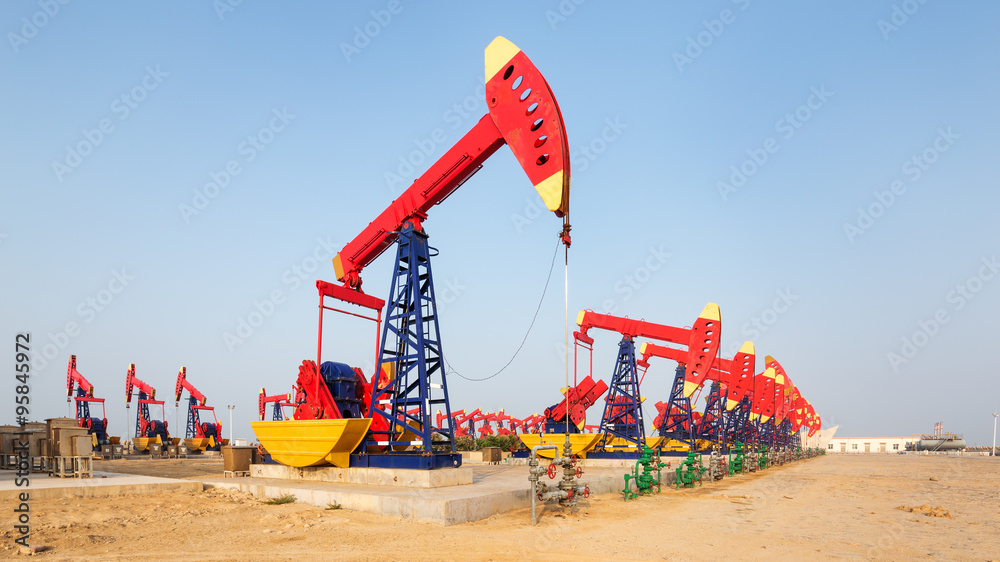 view of oilfield with pump units running