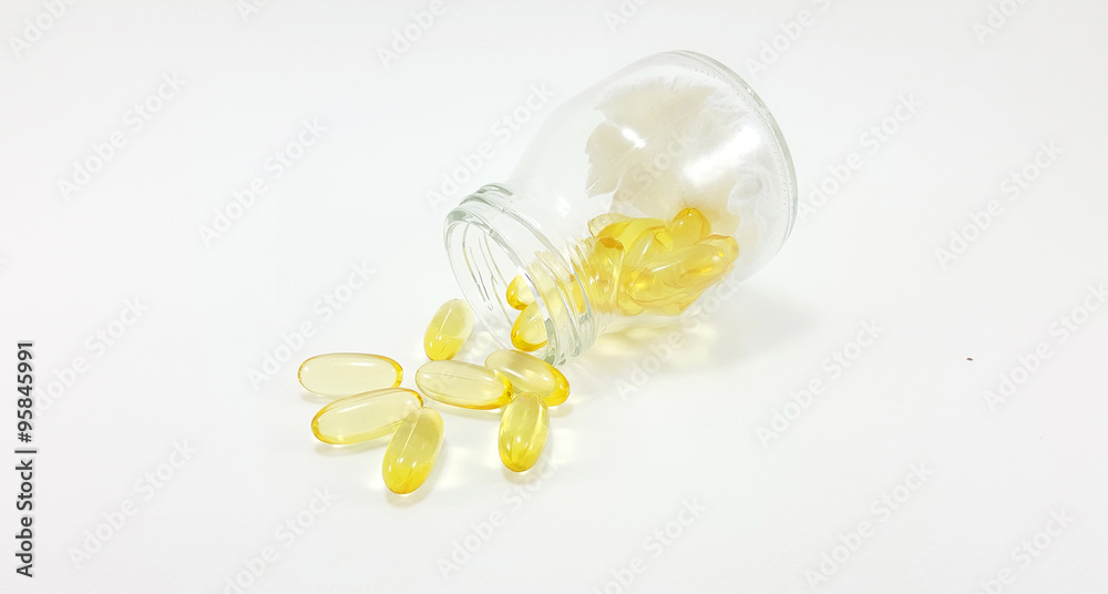 Fish oil capsules in glass jar Fish oil capsules in glass jar