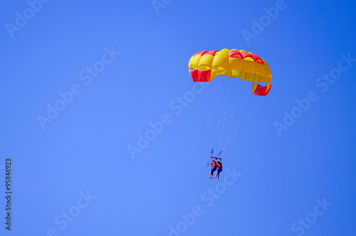 parachute in the blue sky
