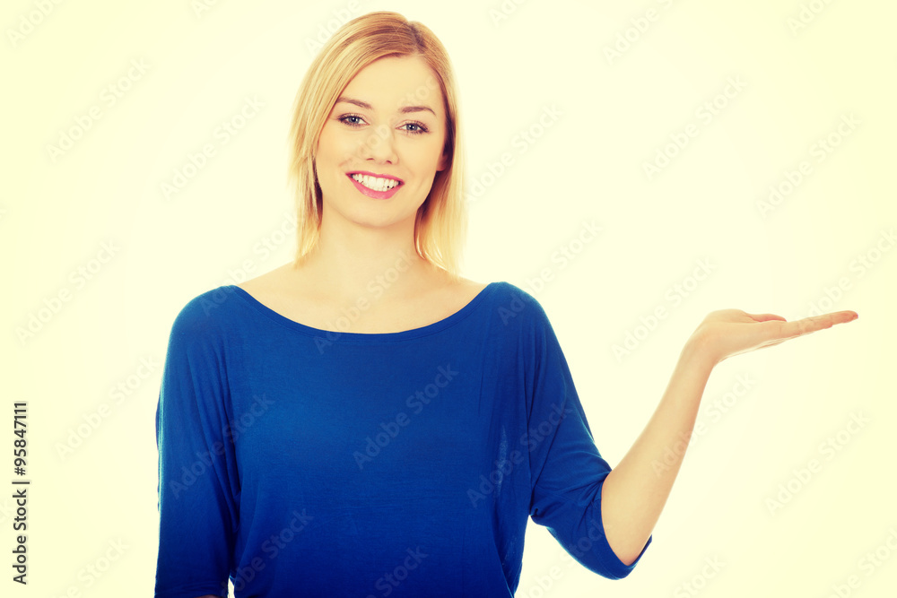 Young woman with open hand. Young woman with open hand.