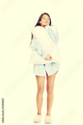 Young morning woman in big shirt.
