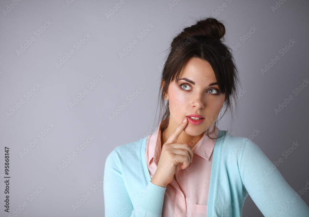 Portrait of an attractive fashionable young brunette woman