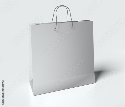 Canvas Print Light gray paper bag with handles on white background. mock up
