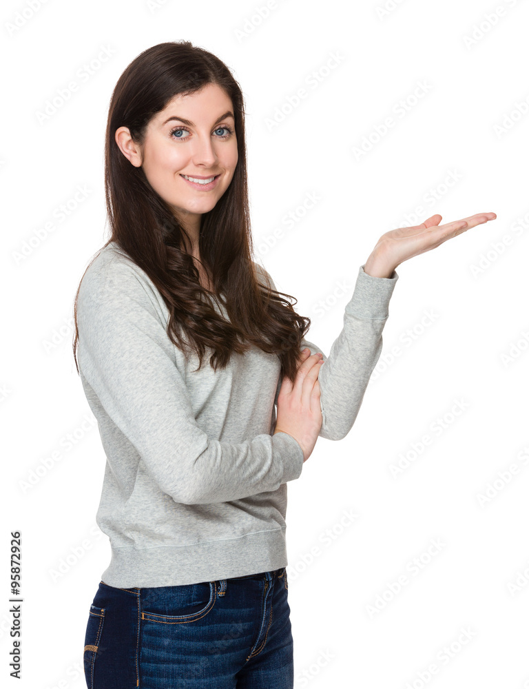 Caucasian woman with hand showing blank sign Caucasian woman with hand showing blank sign