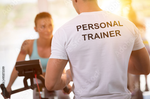 Obraz na plátne Personal trainer on training with  client