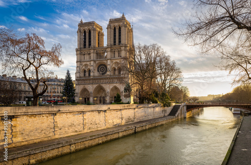 Morning view of Notre Dame de Paris Cathedral on Ile de la Cite. The Seine River and the Cathedral are seen in soft winter light. Paris, 4th arrondissement, France. © Francois Roux