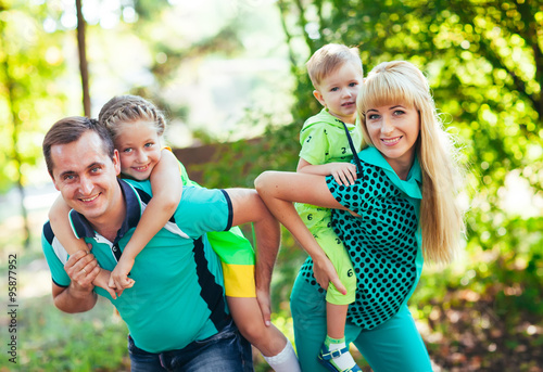 Happy family in the park. Happiness.