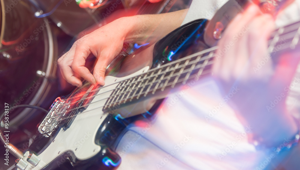 Fototapeta premium aggressive play guitar on stage