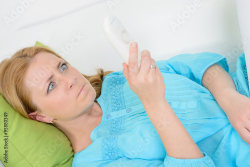 beautiful woman at home angry with telephone