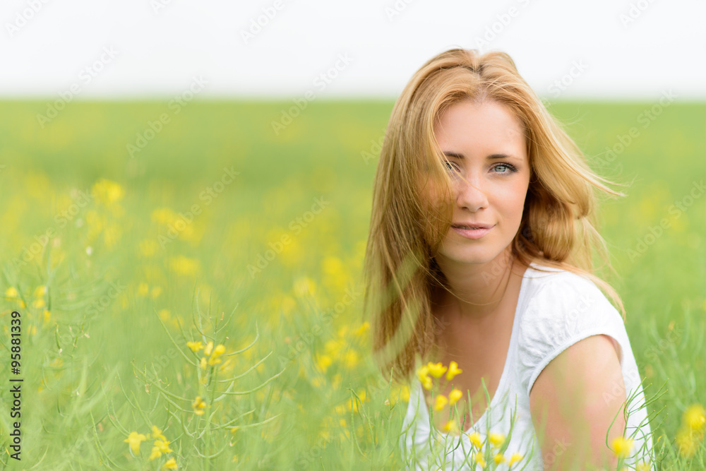 beautiful woman in rape field beautiful woman in rape field