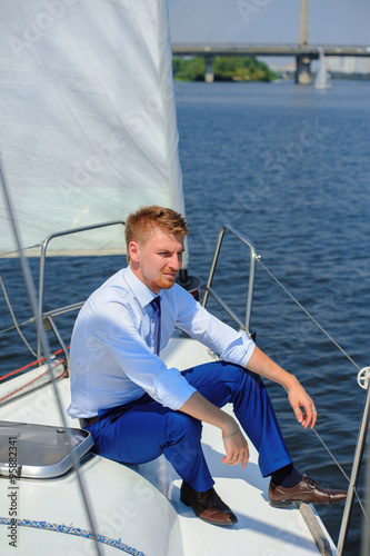 Businessman on a yacht