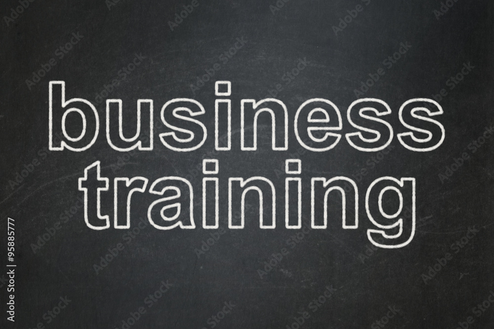 Fototapeta premium Studying concept: Business Training on chalkboard background
