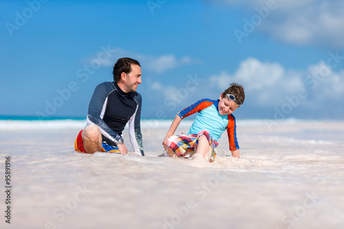 Father with son at beach