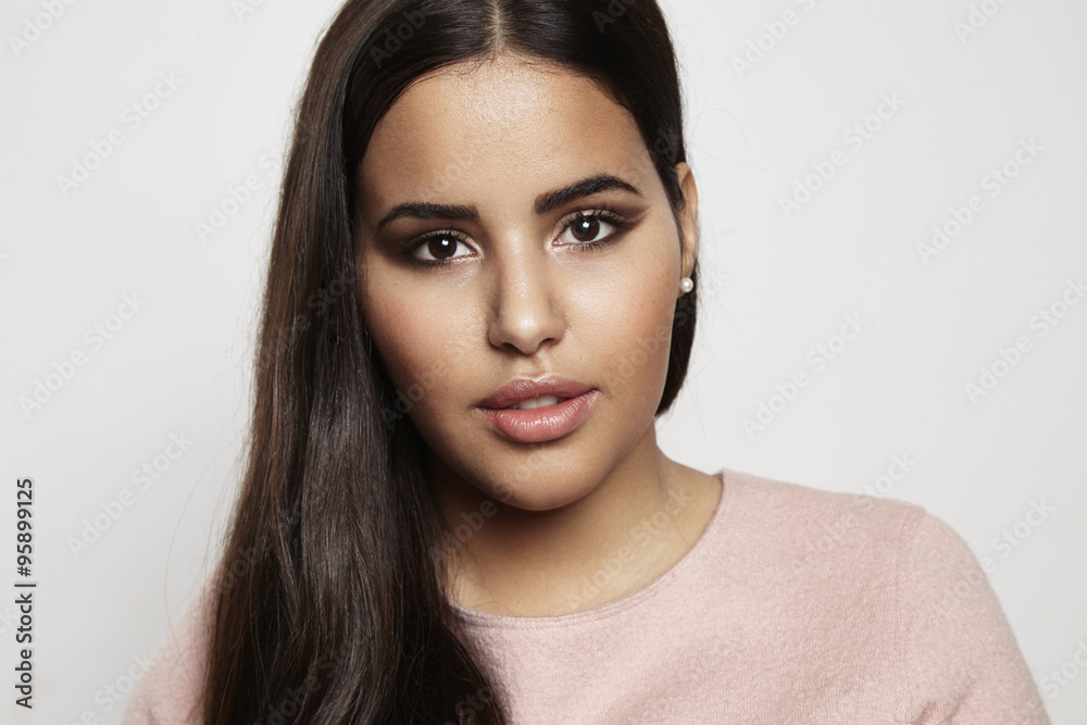 Fototapeta premium pretty elegant latin plus size girl on a white
