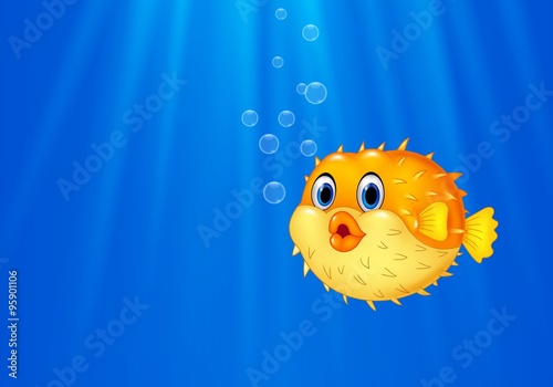 Cartoon funny puffer fish swimming in the ocean