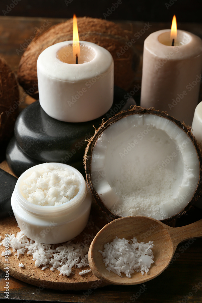 Spa coconut products on dark wooden background Spa coconut products on dark wooden background