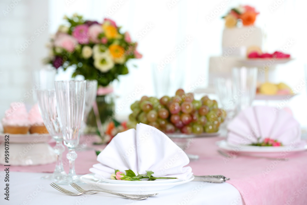 Beautiful served table for wedding or other celebration in restaurant