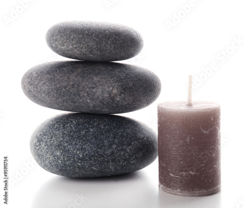 Aroma candle with pebbles isolated on white background