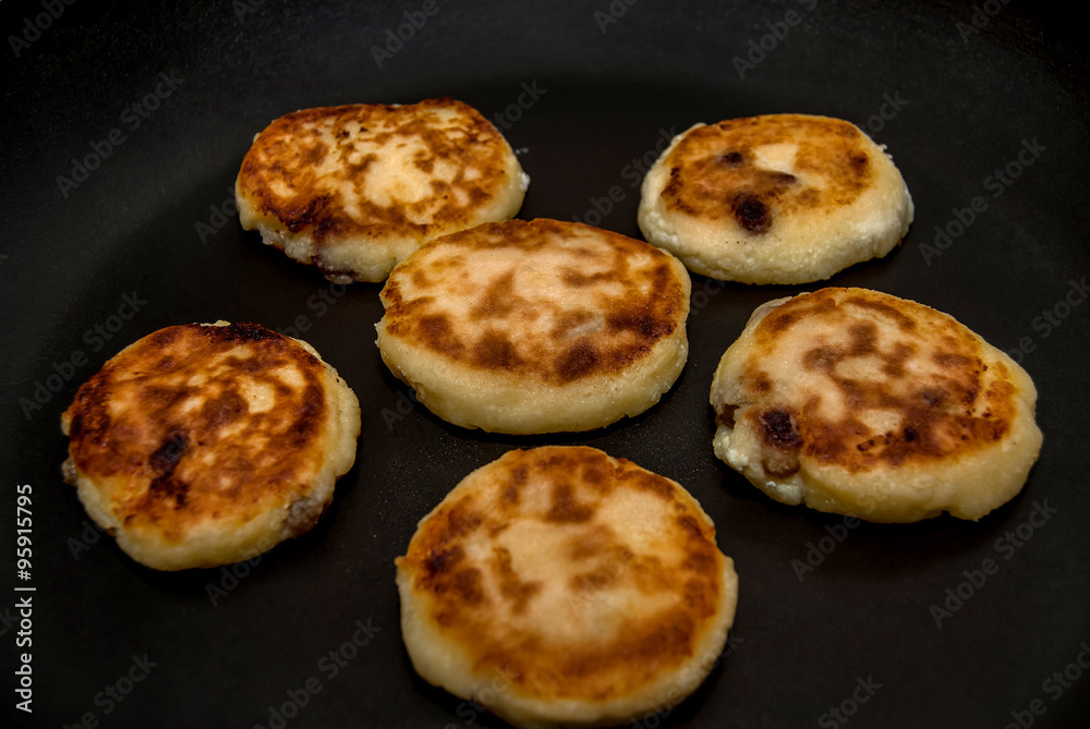 cheese pancakes in a pan