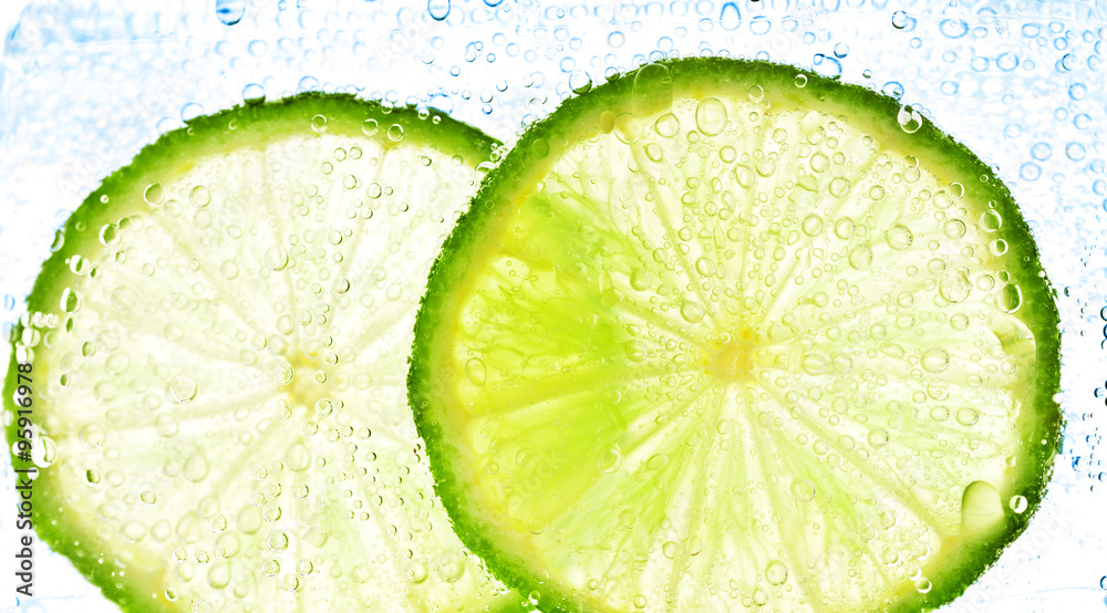 lime with bubbles isolated on white lime with bubbles isolated on white