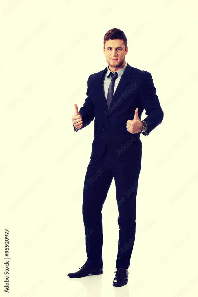 Happy smiling businessman with thumbs up. Happy smiling businessman with thumbs up.