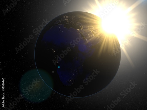 Fototapeta Naklejka Na Ścianę i Meble -  Earth from space Africa at night. Planet Earth in space with big bright sun with rays of light and stars on the background.