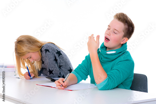 girl and boy together in the classroom photo