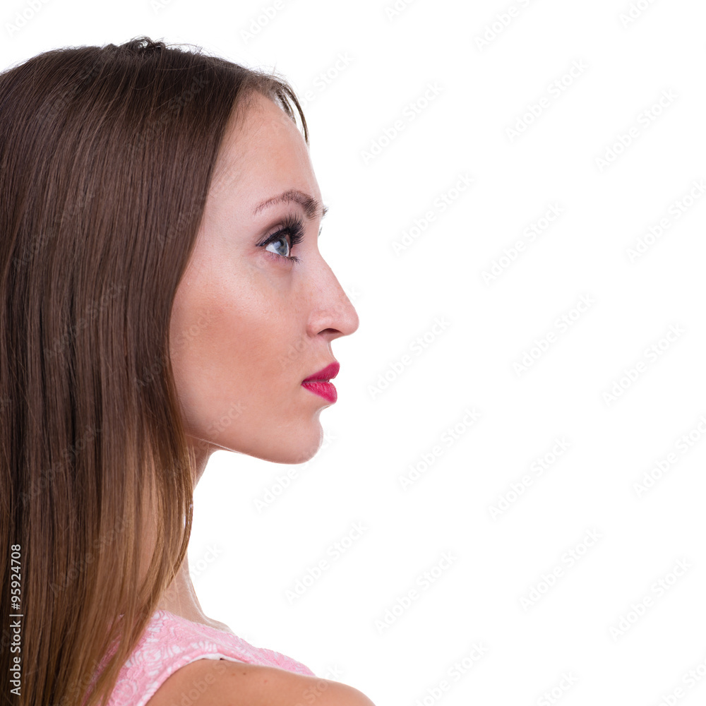 Profile side portrait of beautiful young woman, isolated over white Profile side portrait of beautiful young woman, isolated over white