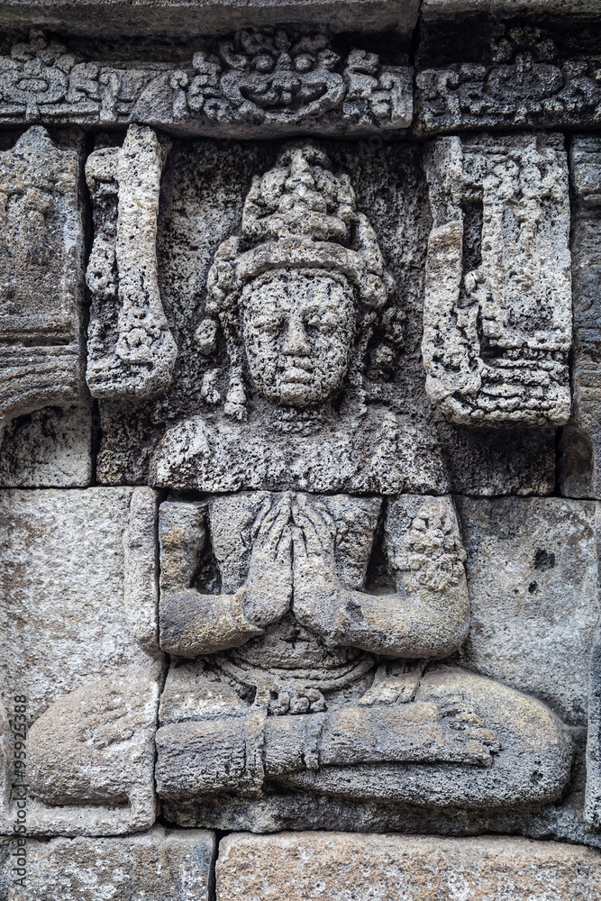 Buddha bas-reliefs at the walls of Borobudur  temple