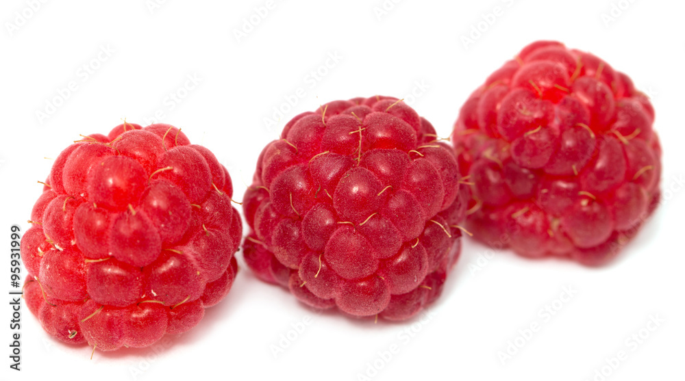 ripe raspberries on a white background ripe raspberries on a white background