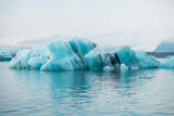 Climate change and global warming. Glacier melting in Iceland. Floating icebergs in Jokulsarlon lagoon.