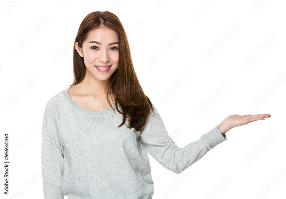 Asian Young Woman with hand showing the blank sign Asian Young Woman with hand showing the blank sign
