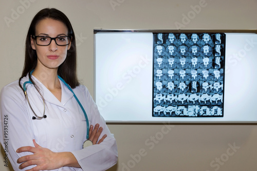 Wallpaper Mural Doctor Examining An X-Ray Image Torontodigital.ca