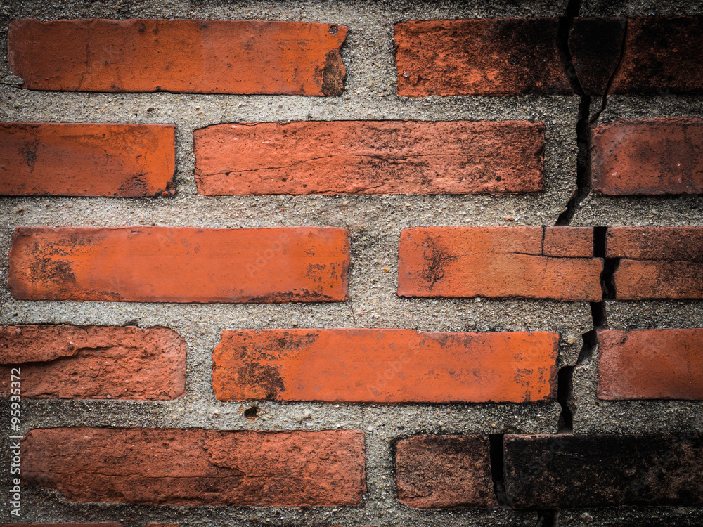 Fototapeta premium A broken old brick wall for background