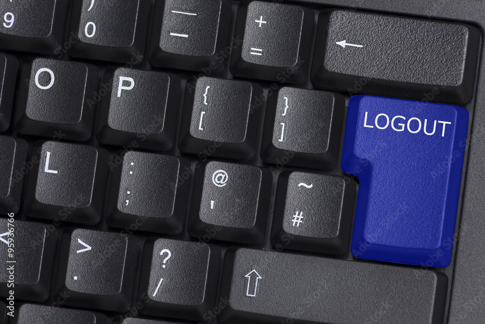 A blue LOGOUT button on computer keyboard A blue LOGOUT button on computer keyboard
