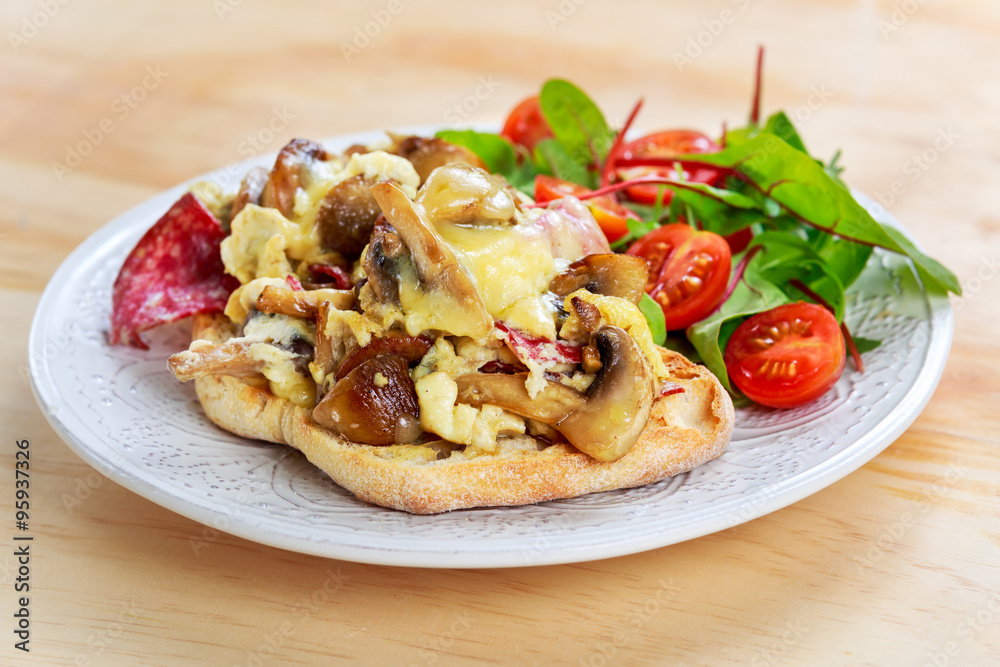 Rustic Morning Breakfast, toast with mushrooms, cheese omelette and fresh vegetables Rustic Morning Breakfast, toast with mushrooms, cheese omelette and fresh vegetables
