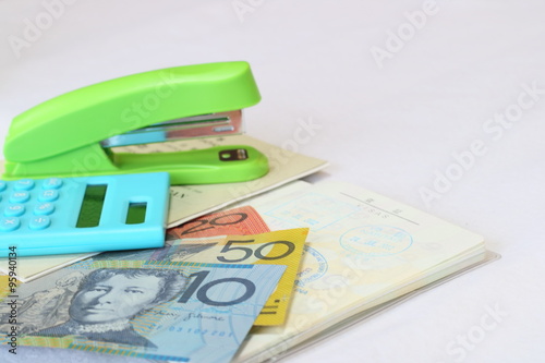 Calculator and stapler and Australian Dollar