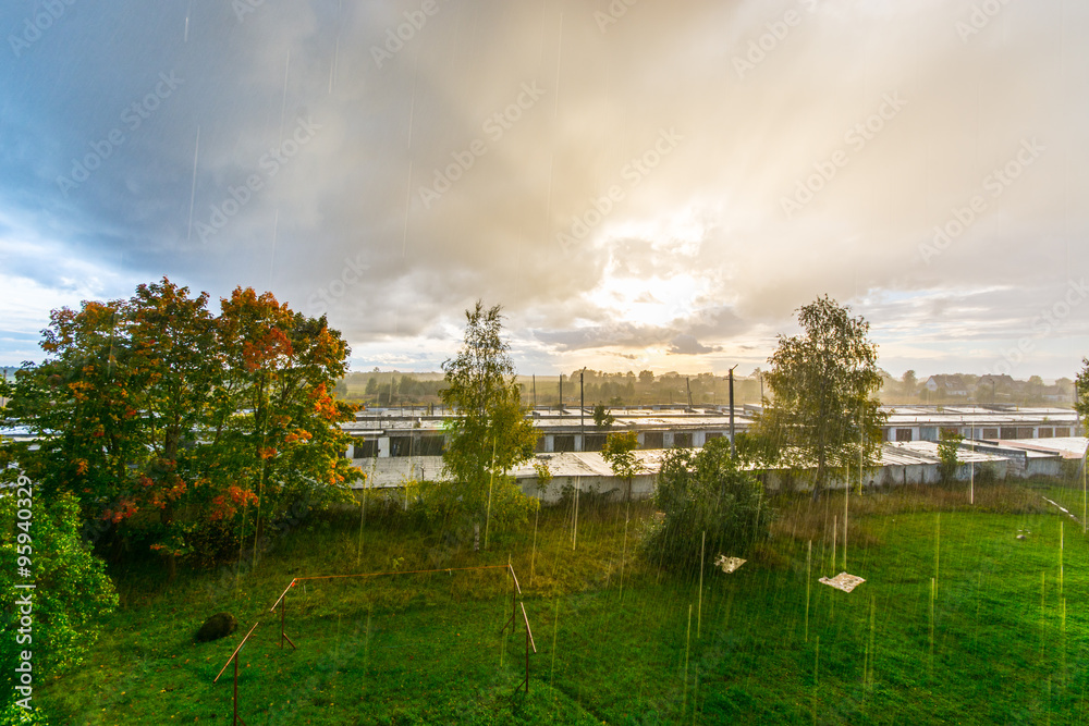 Sun and rain. Massive sky. Nature landscape. Sunset Sun and rain. Massive sky. Nature landscape. Sunset