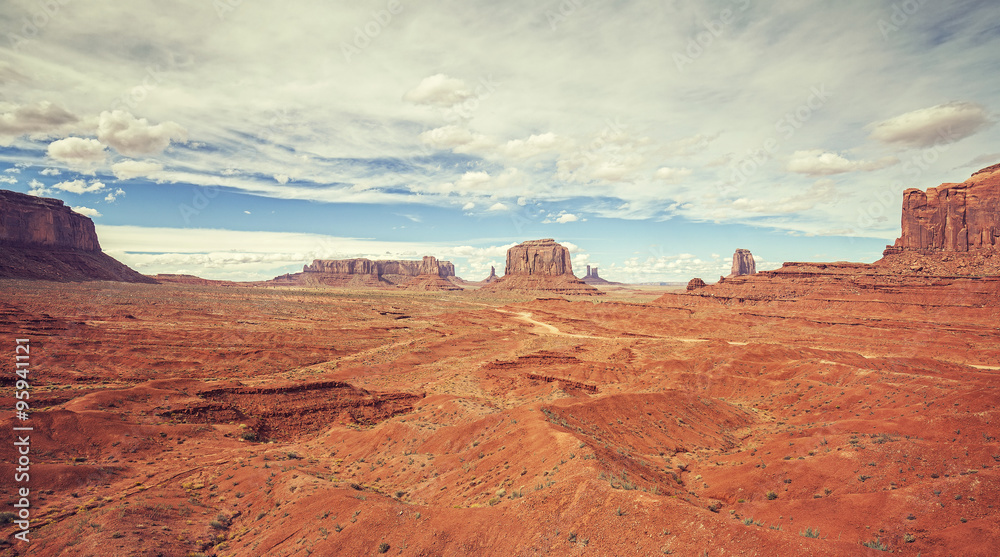 Vintage old film style photo of Monument Valley, USA.