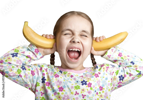 Screaming the girl closed her ears with bananas