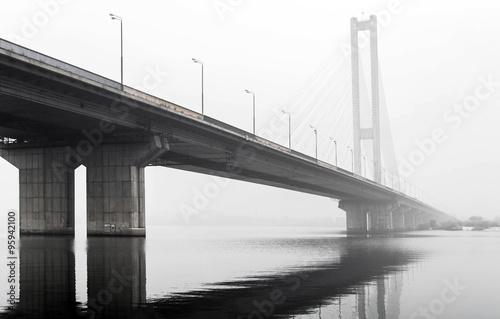 Fototapeta Naklejka Na Ścianę i Meble -  bridge over the river in the fog